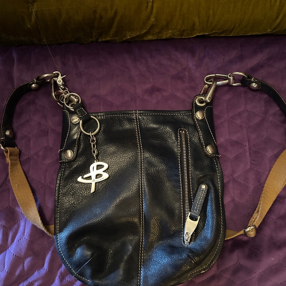 B. Makowsky Black and Tan Crossbody Bags with Classic Design